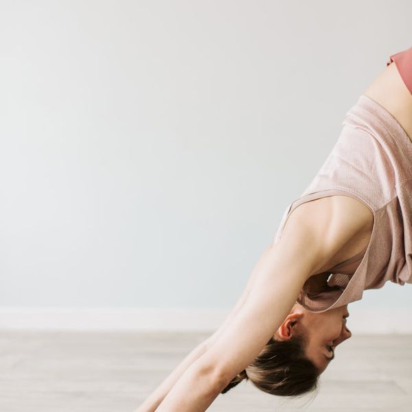 A focused athlete in a meditative state before a workout session.